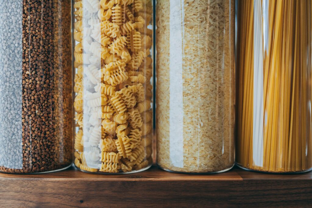 various-pasta-and-cereal-grains-in-a-plastic-jars-min