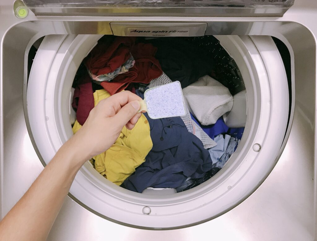 a-man-doing-laundry-min