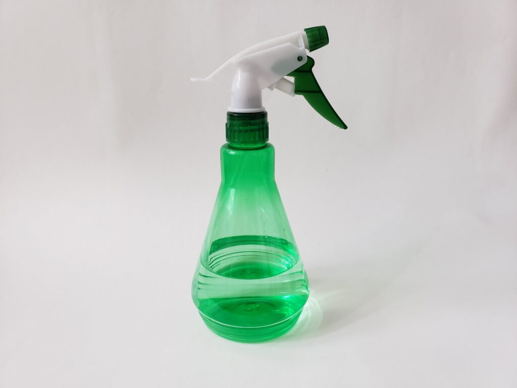 simple-object-on-neutral-background-spray-bottle